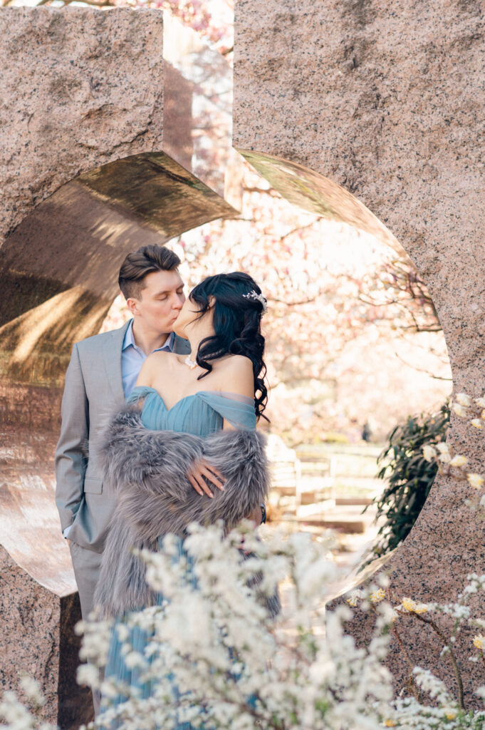 Kathleen Marie Ward photography dreamy engagement session at the Enid A. Haupt Garden at the Smithsonian Castle in Washington, DC during magnolia season